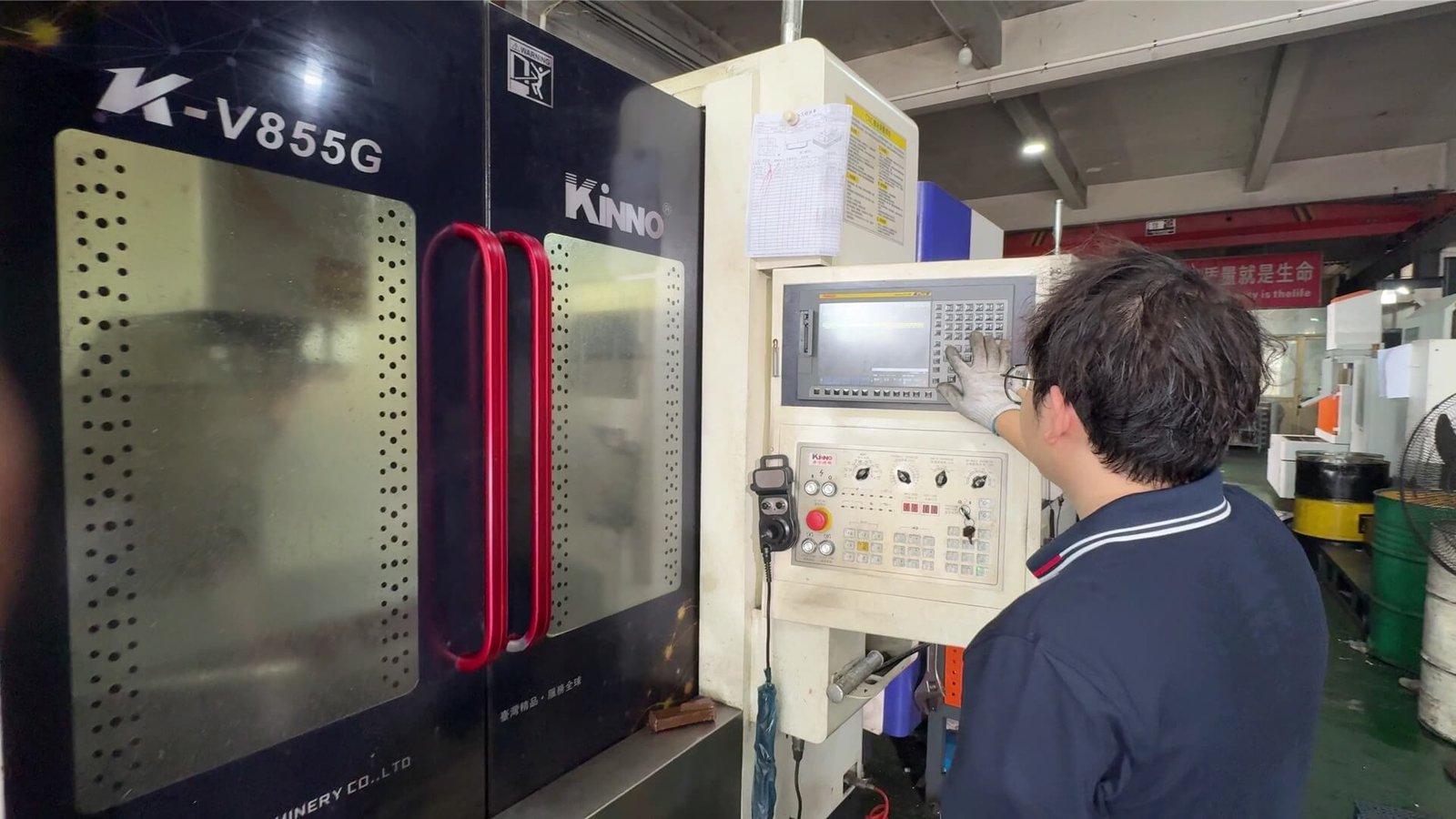 Engineers are debugging CNC equipment for mold making.